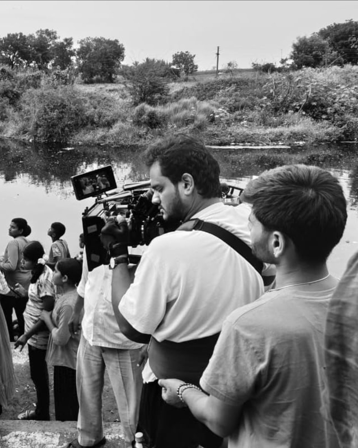 Navagat Prakash Sharma operating camera on location